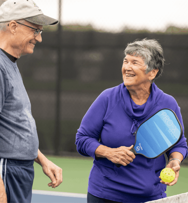 Three residents of a senior living community near Lititz, PA play pickleball