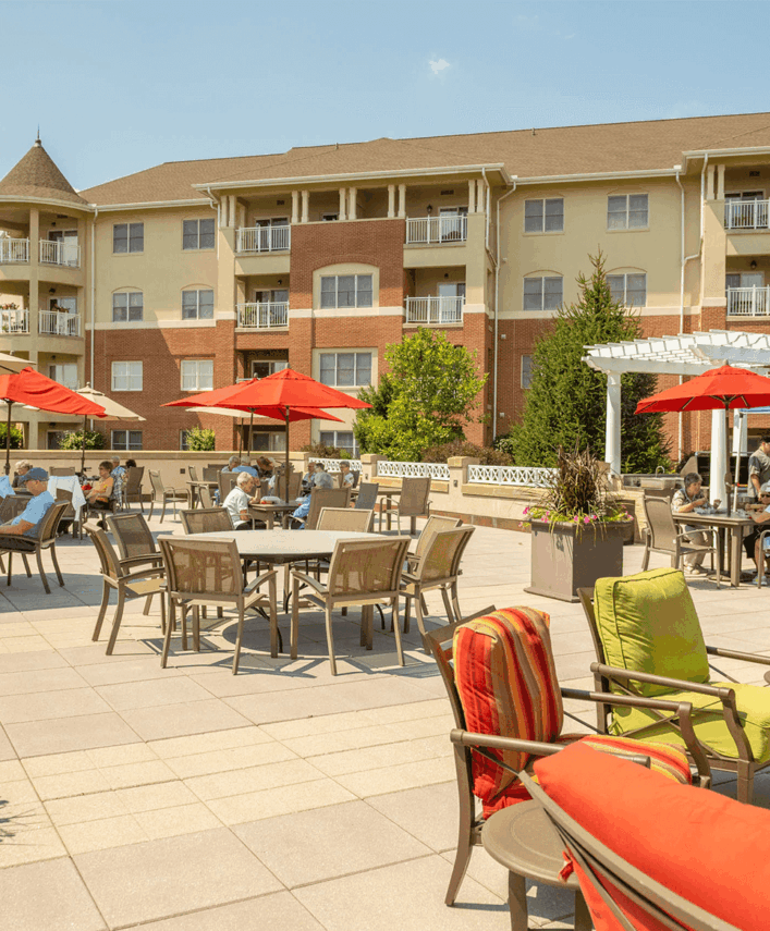 Senior living campus near Lititz, PA with a patio and outdoor tables