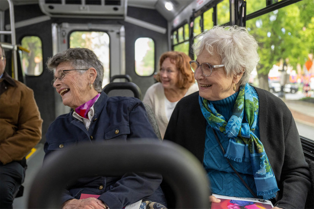 Residents of a retirement community enjoy transportation options for seniors to downtown Lancaster