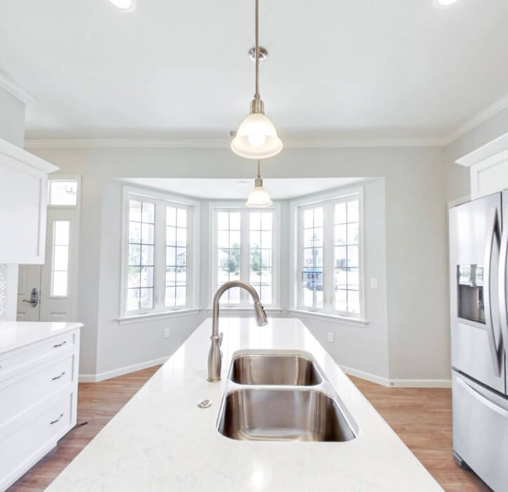 The Allegheny Villa with a large kitchen island and big windows