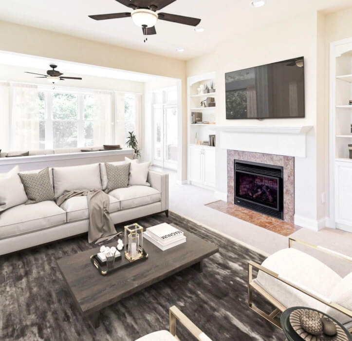 The Fulton Villa with a wooden coffee table and a gray couch with a TV mounted on the wall