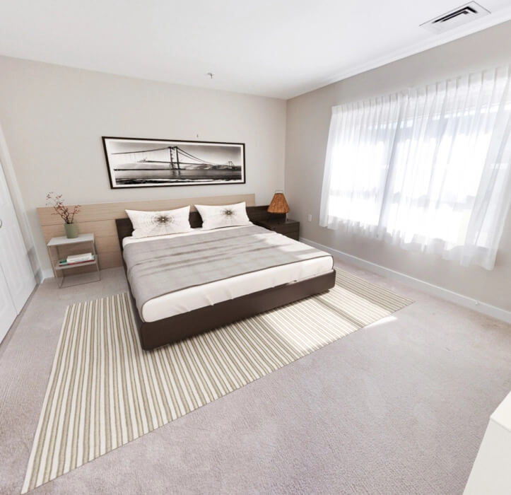 A deluxe studio apartment for seniors with a bed in the center of the room